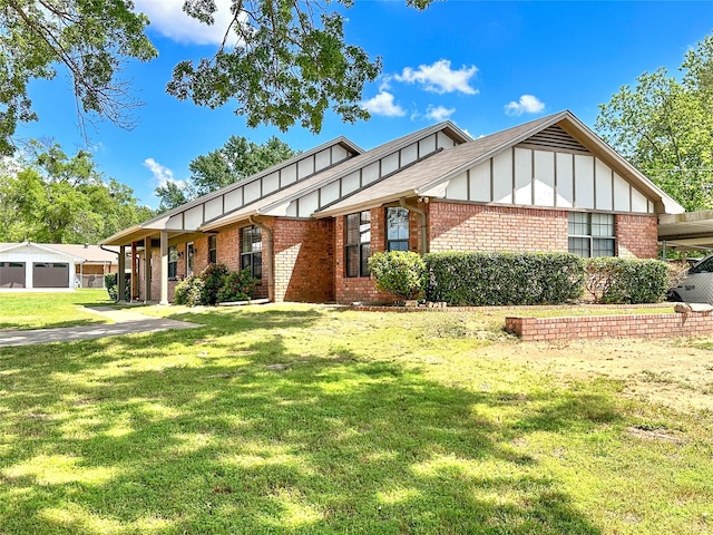 104 W Perry St, Frankston, TX 75763 - tudor-style house with brick siding, a front lawn, and board and batten siding
