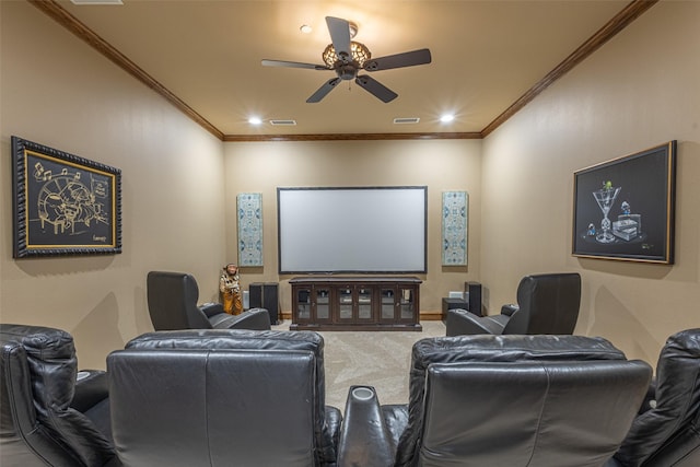 carpeted cinema room with crown molding, a ceiling fan, and recessed lighting