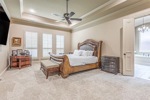 4230 Indian Creek Ln, Frisco, TX 75033 - carpeted bedroom with a raised ceiling, ornamental molding, multiple windows, a chandelier, and ensuite bathroom