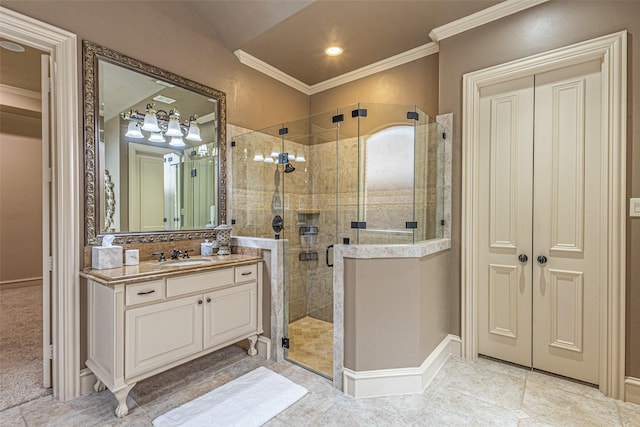 4230 Indian Creek Ln, Frisco, TX 75033 - bathroom featuring crown molding, vanity, baseboards, and a shower stall