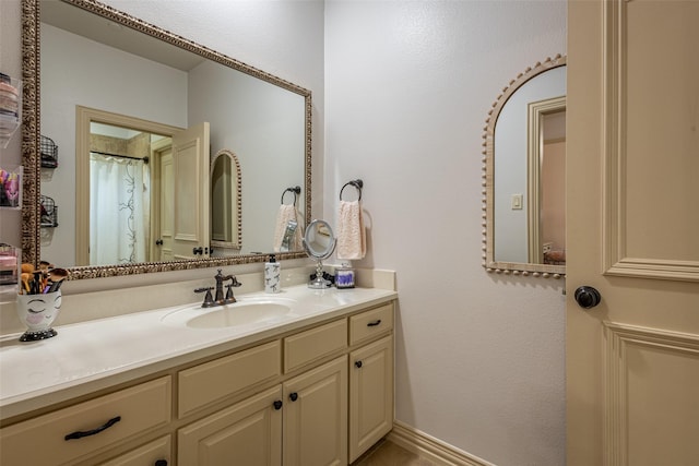 full bath featuring vanity
