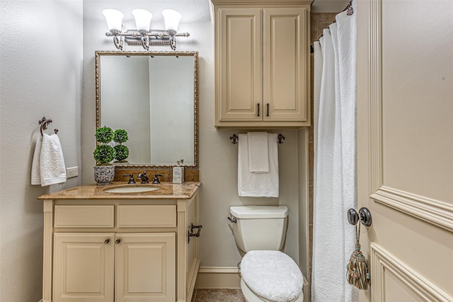 4230 Indian Creek Ln, Frisco, TX 75033 - bathroom with vanity, toilet, and baseboards