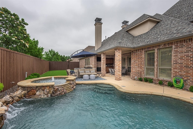view of pool featuring a patio, outdoor lounge area, a fenced backyard, and a fenced in pool