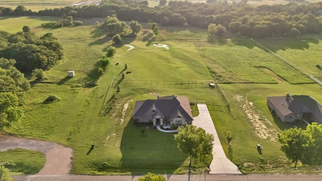 birds eye view of property featuring a rural view