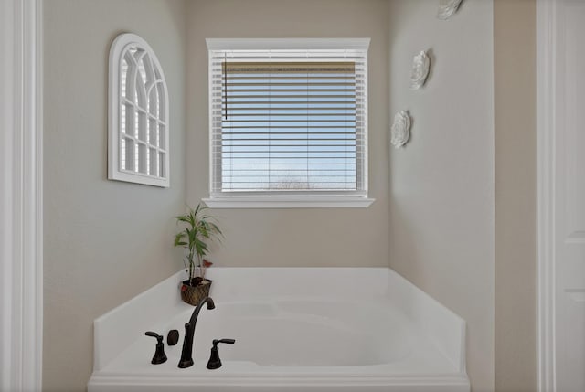 full bathroom featuring a bath