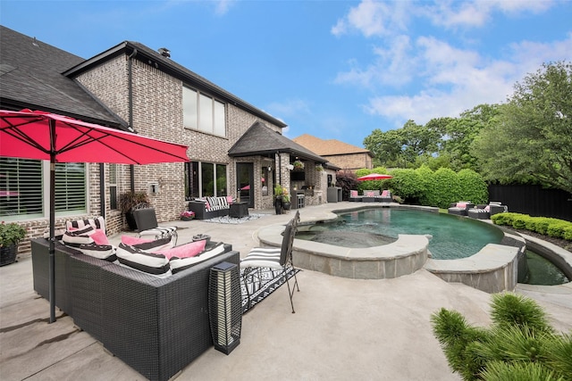 1005 Mallard Lakes Dr, Mckinney, TX 75072 - view of swimming pool featuring a patio, outdoor lounge area, and a pool with connected hot tub