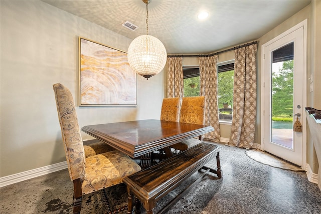 1005 Mallard Lakes Dr, Mckinney, TX 75072 - dining space with baseboards and a chandelier
