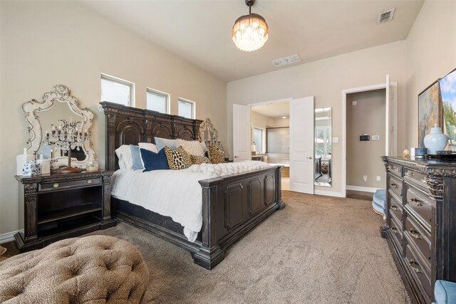 1005 Mallard Lakes Dr, Mckinney, TX 75072 - bedroom with carpet floors, multiple windows, baseboards, and ensuite bathroom