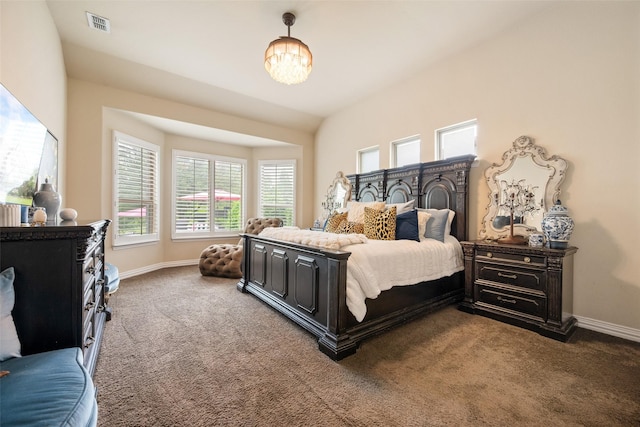 1005 Mallard Lakes Dr, Mckinney, TX 75072 - bedroom with carpet floors, baseboards, and a chandelier
