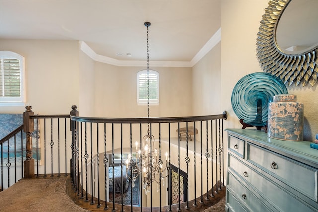 1005 Mallard Lakes Dr, Mckinney, TX 75072 - corridor with a chandelier, an upstairs landing, crown molding, and carpet flooring