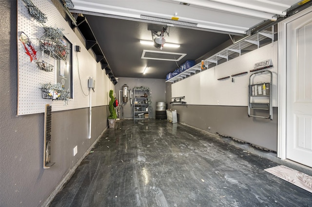 1005 Mallard Lakes Dr, Mckinney, TX 75072 - garage with a garage door opener and baseboards