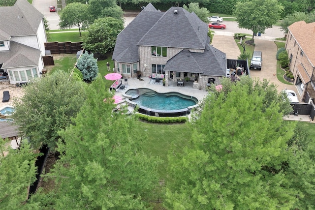 1005 Mallard Lakes Dr, Mckinney, TX 75072 - view of swimming pool featuring a patio area and a pool with connected hot tub