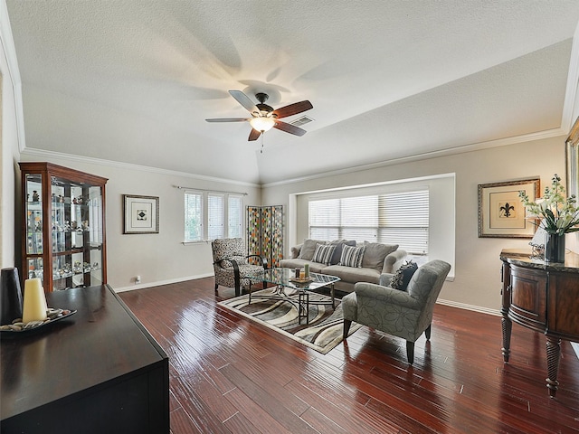 2420 Forest Gate Dr, Little Elm, TX 75068 - living area featuring a ceiling fan, baseboards, wood finished floors, crown molding, and vaulted ceiling