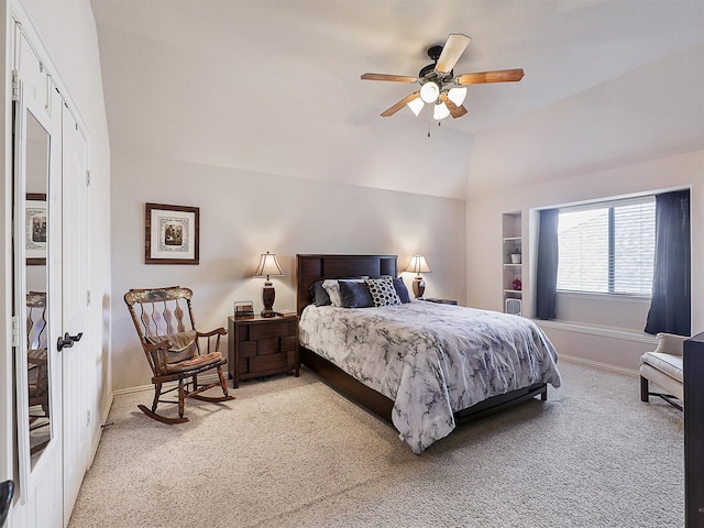 2420 Forest Gate Dr, Little Elm, TX 75068 - bedroom with light colored carpet, baseboards, lofted ceiling, and a ceiling fan