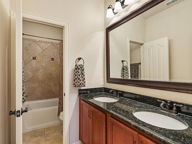 2420 Forest Gate Dr, Little Elm, TX 75068 - bathroom featuring toilet, double vanity, tile patterned flooring, and shower / bath combo