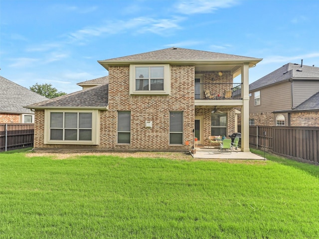 2420 Forest Gate Dr, Little Elm, TX 75068 - back of property with a balcony, roof with shingles, ceiling fan, a patio, and brick siding