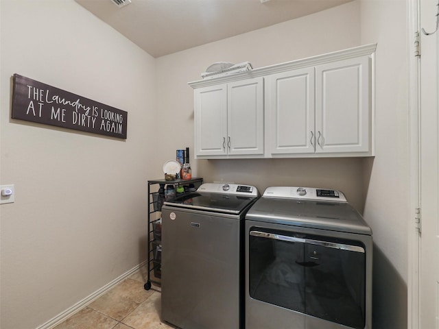 2420 Forest Gate Dr, Little Elm, TX 75068 - laundry room with independent washer and dryer, cabinet space, baseboards, and light tile patterned floors