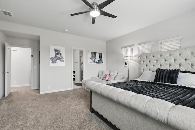 1036 Fairfax Dr, Godley, TX 76044 - carpeted bedroom with baseboards and a ceiling fan