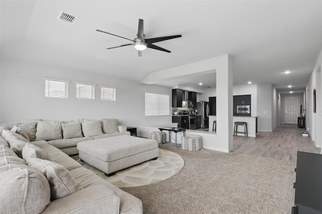 1036 Fairfax Dr, Godley, TX 76044 - living area featuring a ceiling fan, light colored carpet, baseboards, and recessed lighting