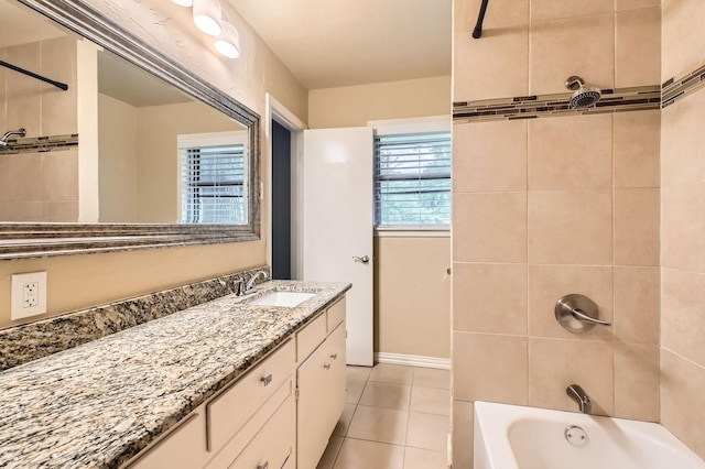 full bath featuring tub / shower combination, tile patterned flooring, and vanity