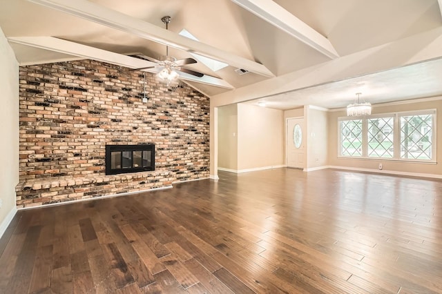 unfurnished living room with a fireplace, baseboards, vaulted ceiling with beams, wood finished floors, and visible vents