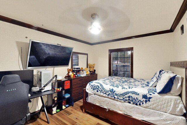 2241 Riviera Dr, Dallas, TX 75211 - bedroom with baseboards, crown molding, visible vents, and wood finished floors