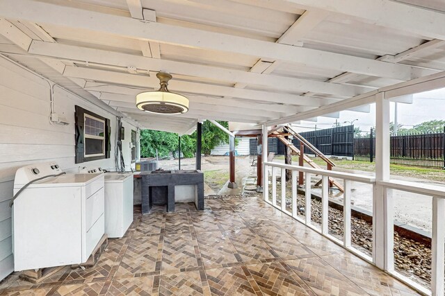 2241 Riviera Dr, Dallas, TX 75211 - bedroom with ceiling fan, a closet, wood finished floors, and ornamental molding