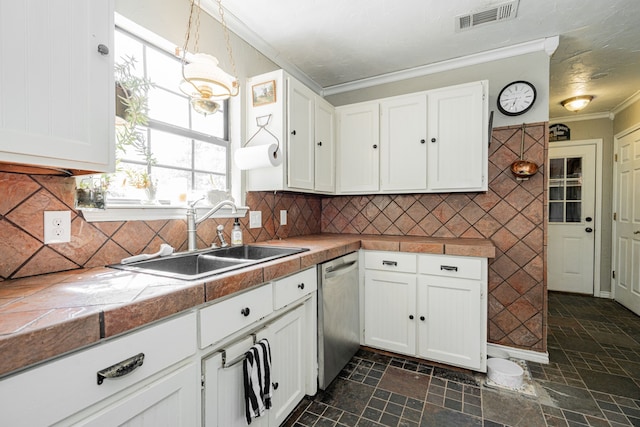 kitchen featuring visible vents, crown molding, dishwasher, a sink, and white cabinetry