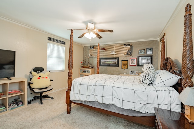 carpeted bedroom featuring crown molding, baseboards, and ceiling fan
