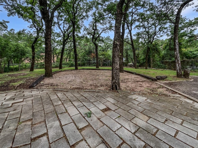 view of patio featuring fence