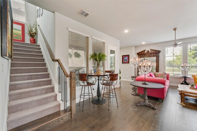 dining room featuring visible vents, stairs, wood finished floors, ceiling fan, and recessed lighting