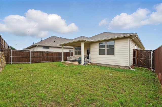 628 Coleman St, Aubrey, TX 76227 - back of house featuring a patio, a fenced backyard, a yard, and an outdoor hangout area