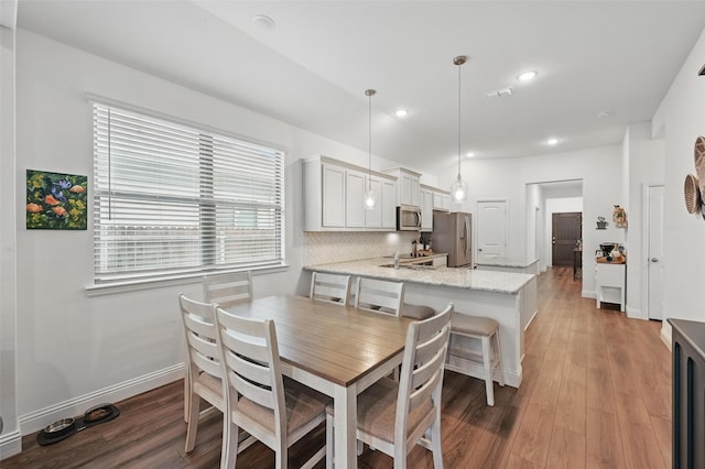 628 Coleman St, Aubrey, TX 76227 - dining area featuring baseboards, recessed lighting, and wood finished floors