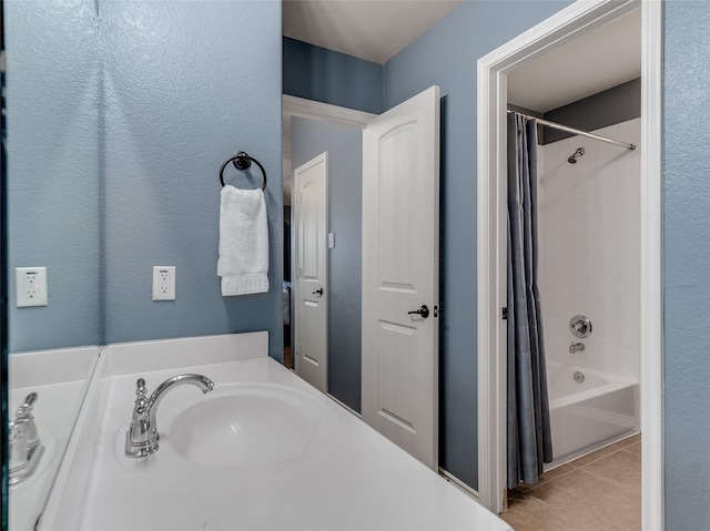 5732 Chateau Dr, Sachse, TX 75048 - bathroom featuring tile patterned flooring, shower / bath combo with shower curtain, and vanity