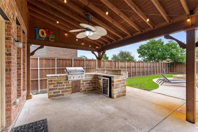 5732 Chateau Dr, Sachse, TX 75048 - fenced backyard featuring a patio area, a ceiling fan, and beverage cooler