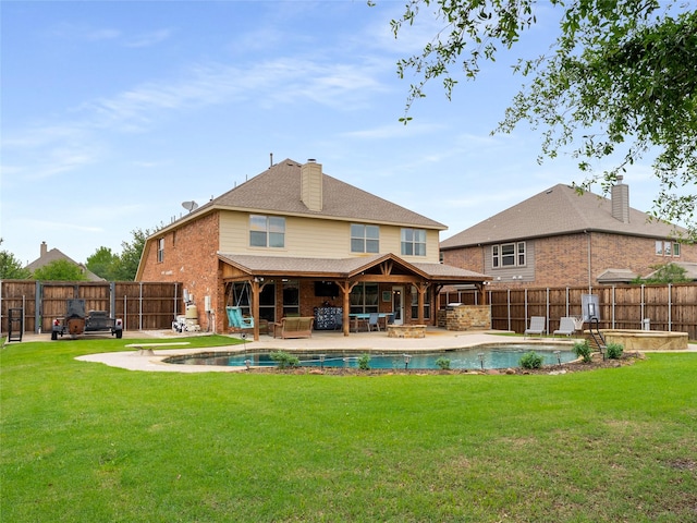 5732 Chateau Dr, Sachse, TX 75048 - back of house featuring a patio, an in-ground hot tub, brick siding, and a chimney