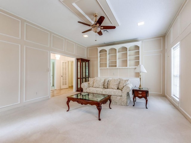 12203 Cross Creek Dr, Dallas, TX 75243 - living room featuring ceiling fan, plenty of natural light, and a decorative wall