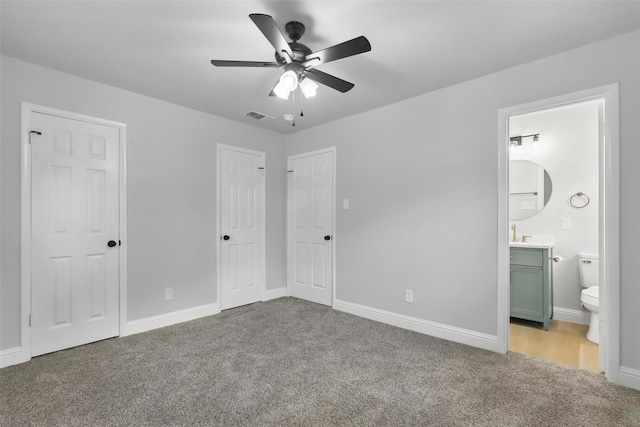 2708 Ash Park Dr, Richland Hills, TX 76118 - unfurnished bedroom featuring carpet floors, ensuite bathroom, baseboards, and ceiling fan