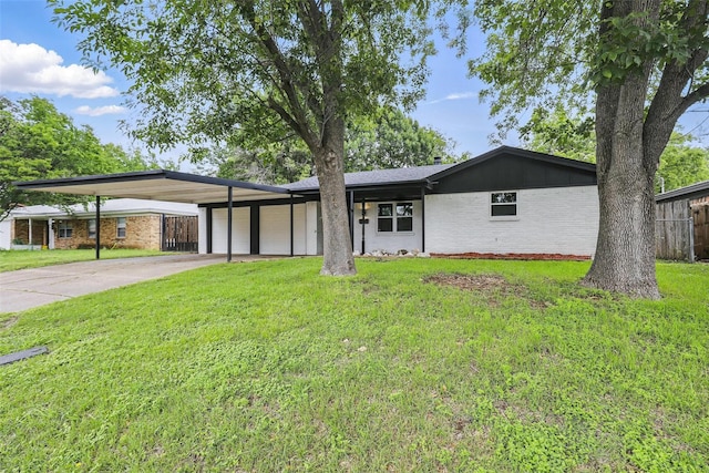 2708 Ash Park Dr, Richland Hills, TX 76118 - mid-century modern home with a garage, brick siding, a carport, and concrete driveway