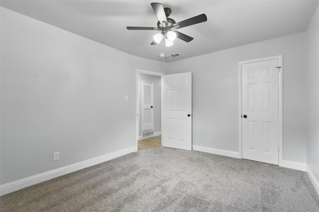 2708 Ash Park Dr, Richland Hills, TX 76118 - unfurnished bedroom with carpet, baseboards, and a ceiling fan