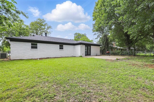 2708 Ash Park Dr, Richland Hills, TX 76118 - rear view of property featuring central AC, a patio, and brick siding