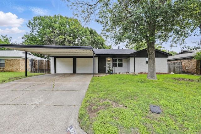 2708 Ash Park Dr, Richland Hills, TX 76118 - mid-century modern home featuring an attached garage, driveway, brick siding, and a carport