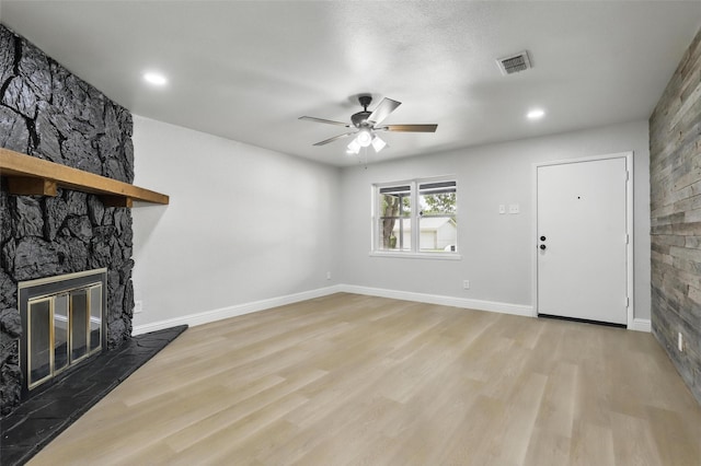2708 Ash Park Dr, Richland Hills, TX 76118 - unfurnished living room featuring a ceiling fan, light wood-style flooring, a fireplace, recessed lighting, and baseboards