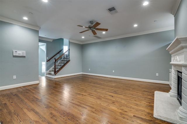 unfurnished living room with stairs, a ceiling fan, recessed lighting, and visible vents