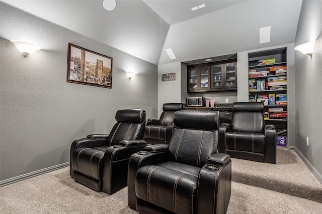 8480 Kincaid Ln, Frisco, TX 75036 - cinema with carpet floors, baseboards, and vaulted ceiling