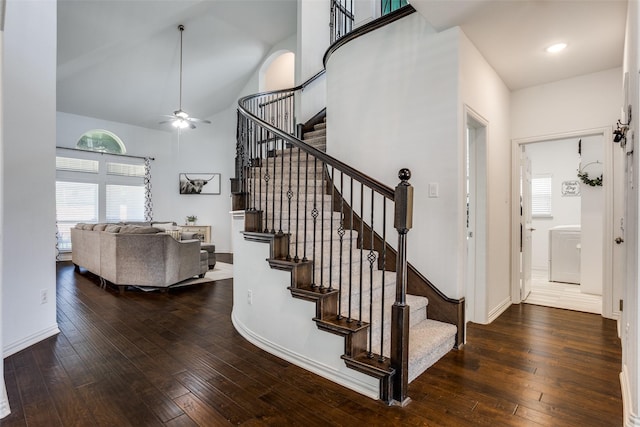 8480 Kincaid Ln, Frisco, TX 75036 - stairway with wood-type flooring, washer / dryer, ceiling fan, and high vaulted ceiling
