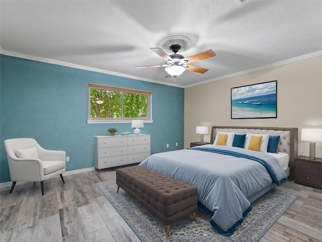 2345 Ravenwood Dr, Grand Prairie, TX 75050 - bedroom featuring light wood-style floors, baseboards, ornamental molding, and ceiling fan