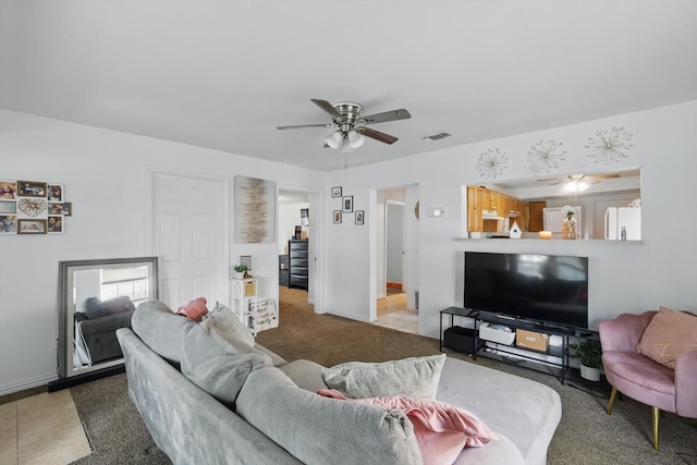 2805 Hale Ave, Fort Worth, TX 76106 - carpeted living room featuring baseboards, ceiling fan, and visible vents
