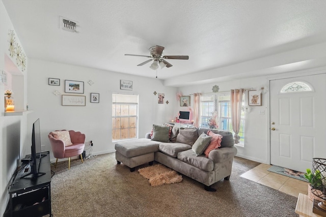 2805 Hale Ave, Fort Worth, TX 76106 - living room featuring visible vents, a ceiling fan, carpet flooring, and a wealth of natural light