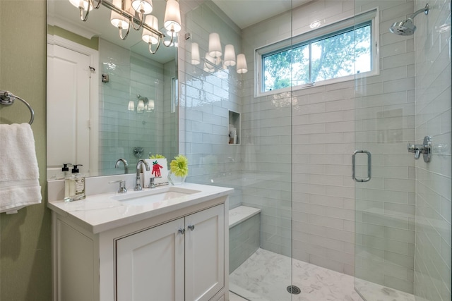 bathroom with vanity and a stall shower